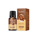 Massage essential oil bottle and box in amber brown with black cap, golden label and dried citrus peel illustration; Rose Ginger Mugwort Massage Essential Oil