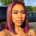 Short Straight Wig with smooth burgundy-purple synthetic strands, a center part, and a sleek blunt shoulder-length cut