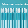 Silicone Ear Cleaning Sticks with transparent adhesive tips and slender teal-tinted shafts arranged in a row