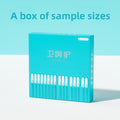 Silicone Ear Cleaning Sticks in a turquoise sample-size box, with rows of white-tipped transparent sticks visible through the front