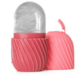 Silicone Ice Pack for Face with coral pink ribbed silicone casing and exposed frosty ice roller head