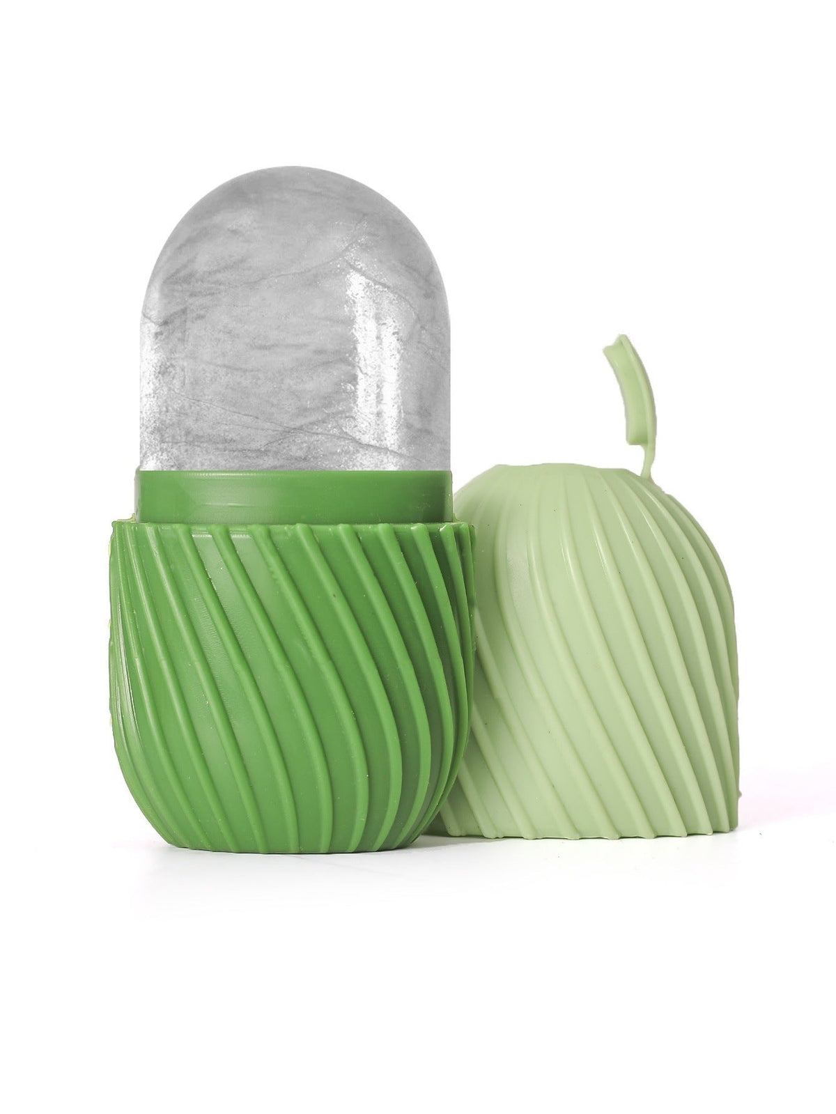 Silicone Ice Pack for Face in light green with a ribbed silicone cup, translucent rounded cooling head and matching cap