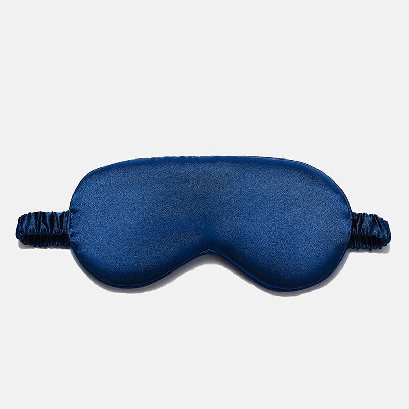 Simulated Silk Sleep Eye Mask in deep navy blue with a smooth, plain finish, contoured eye cups and gathered elastic strap.
