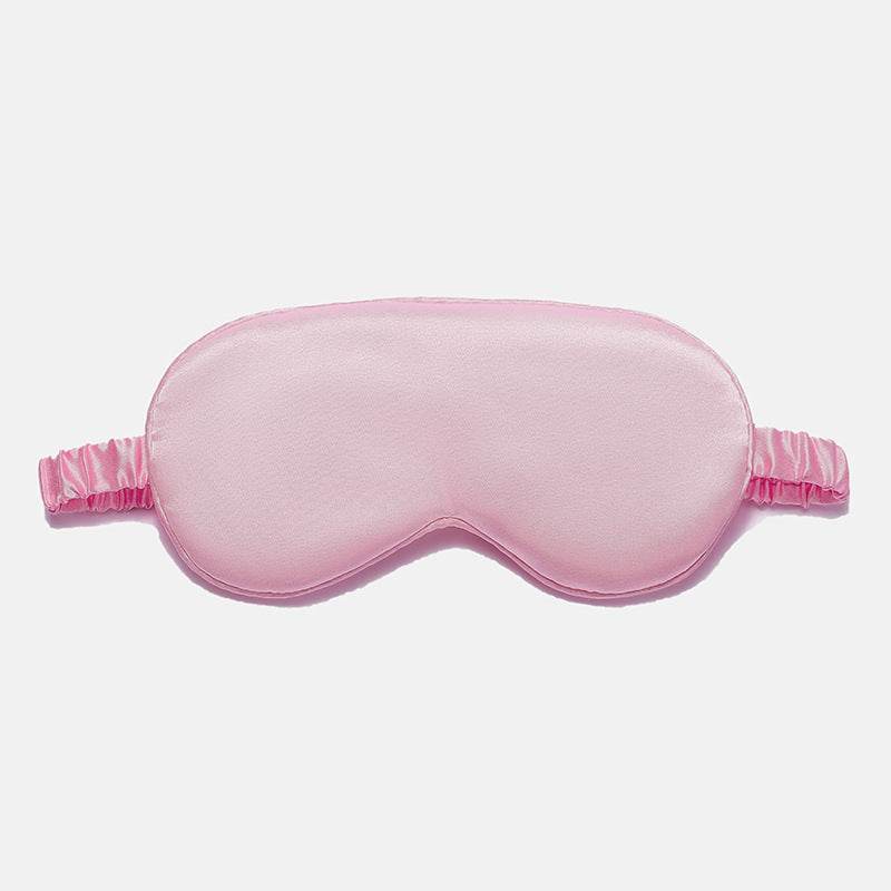 Simulated Silk Sleep Eye Mask in pale pink, with a smooth plain surface, contoured eye shape, and gathered elastic strap.