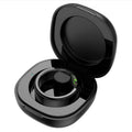 Smart Health Ring, black glossy wearable ring nestled inside an open charging case with visible sensor contacts