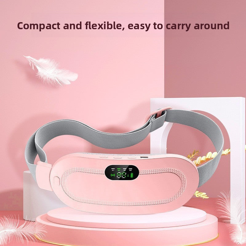 Smart Heating Belt for Pain Relief in pink fabric with gray adjustable strap and central digital temperature display.