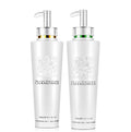 Smoothing Shampoo in two white chamomile bottles with silver pump tops and gold and green neck bands