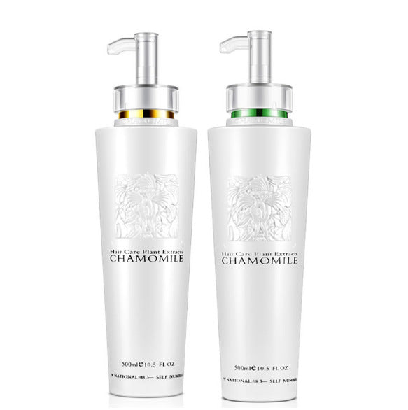 Smoothing Shampoo in two white chamomile bottles with silver pump tops and gold and green neck bands