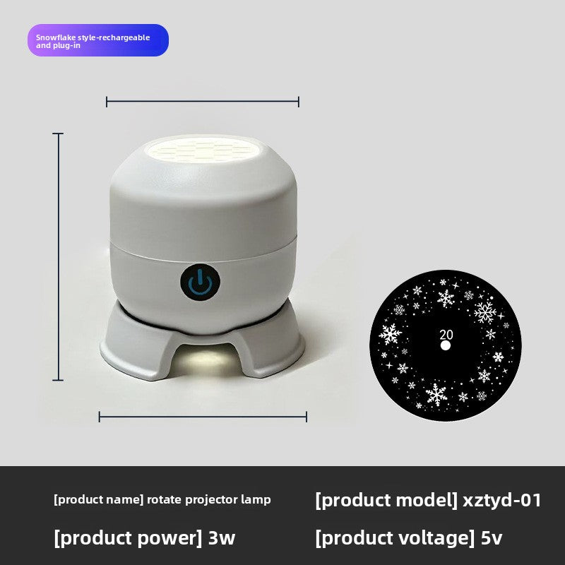 Snowflake Christmas Projection Light with a compact white rounded body, blue power button and circular snowflake pattern disc