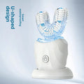 Sonic Electric Toothbrush with a white faceted handle, clear blue-trimmed U-shaped bristle head, and charging base