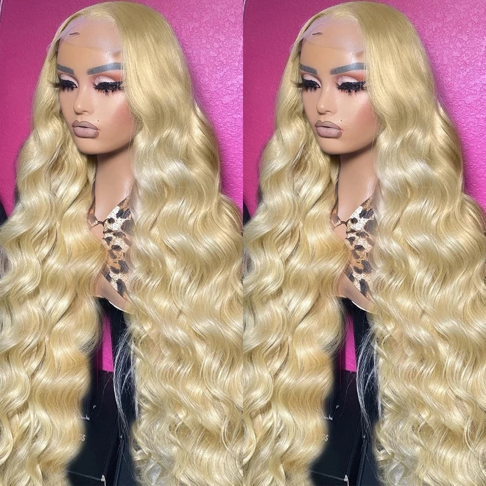 Synthetic Fiber Wigs in pale blonde with a long, loose wavy texture and a sheer lace front hairline.