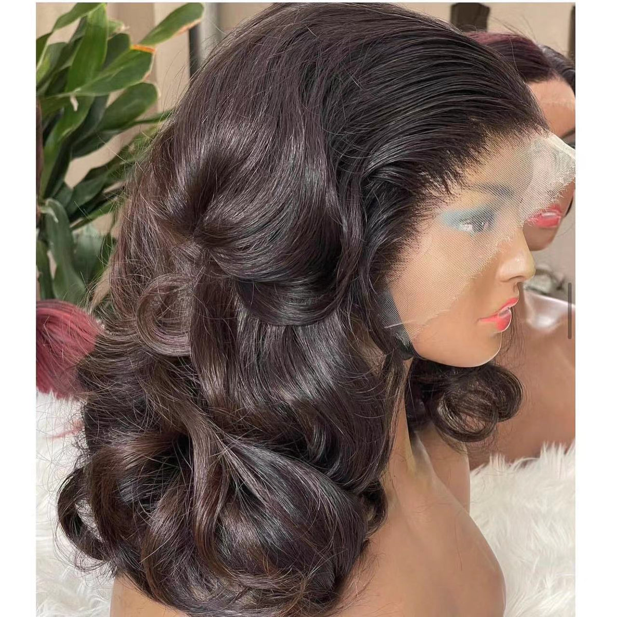 Synthetic Hair Wigs in glossy dark brown, styled in voluminous loose curls with a realistic lace-front hairline