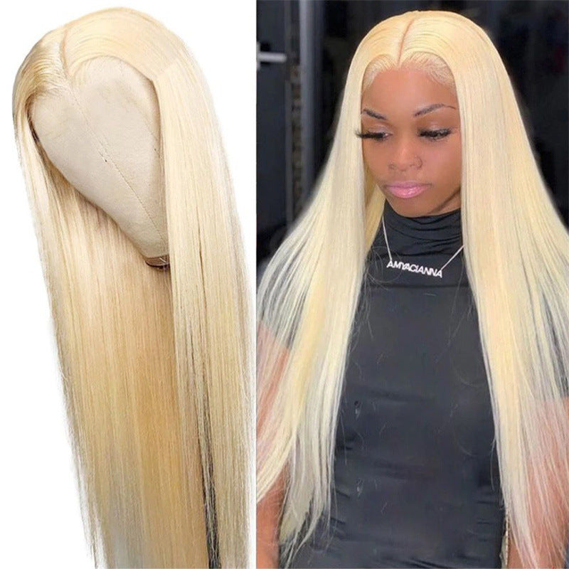 Synthetic Hair Wigs in pale blonde synthetic fiber, worn long and straight with a center part and smooth finish