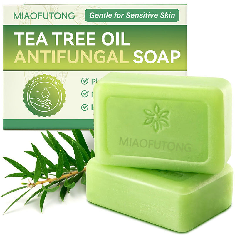 Tea Tree Essential Oil Handmade Cleansing Soap in pale green, smooth rectangular bars with an embossed floral logo and matching box.