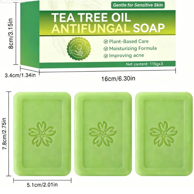 Tea Tree Essential Oil Handmade Cleansing Soap in bright green bars with embossed floral emblems and green antifungal soap packaging.