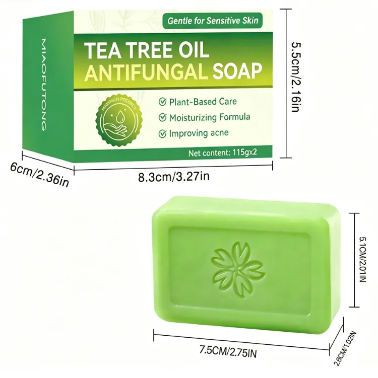 Tea Tree Essential Oil Handmade Cleansing Soap in a bright green rectangular bar with an embossed floral emblem and green box