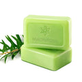 Tea Tree Essential Oil Handmade Cleansing Soap in light green with a smooth rectangular bar shape and embossed logo