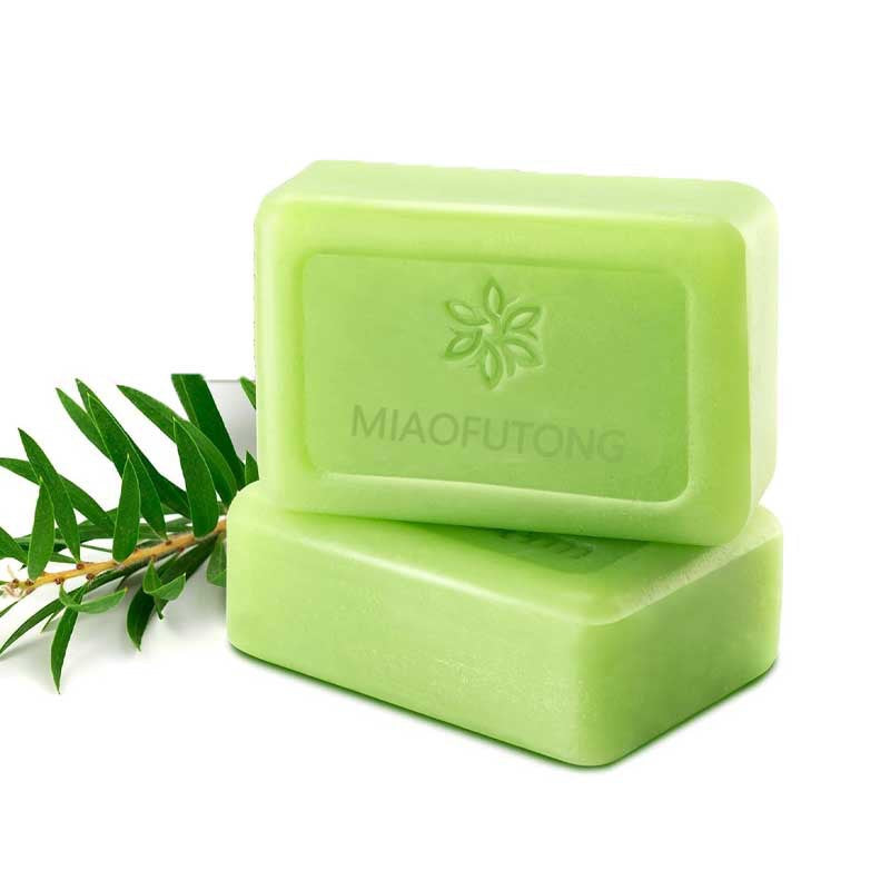 Tea Tree Essential Oil Handmade Cleansing Soap in light green with a smooth rectangular bar shape and embossed logo