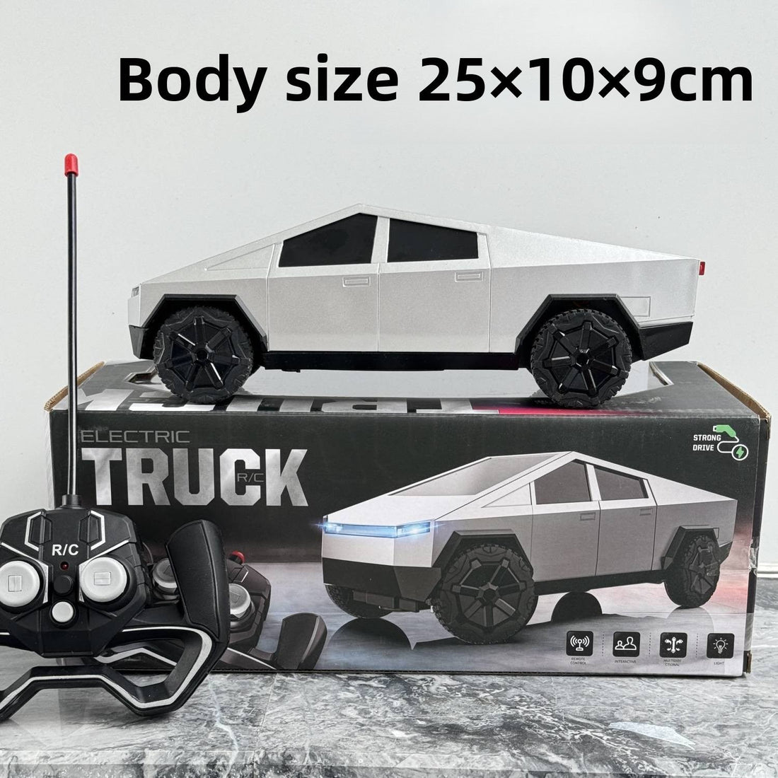 Tesla Style Truck remote control toy in silver plastic, with angular pickup styling, dark windows and chunky black wheels.