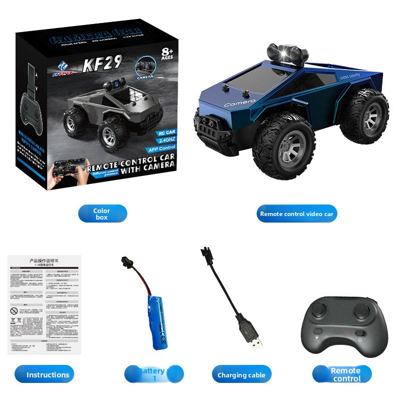 Tesla Toy Truck, a blue plastic remote-control monster truck with oversized black tires, roof camera and spotlight