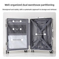 Travel suitcase TSA Combination Lock shown open, with a silver hard shell, gray lining, mesh pockets, and cross straps