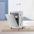 Travel suitcase TSA Combination Lock in silver ribbed hard shell with aluminum frame, front opening compartment and spinner wheels