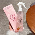 UD CLUB Pearl Protein hair care spray in a clear pink bottle with white trigger nozzle, paired with matching pink box