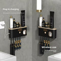 UV Sterilizing Toothbrush Holder, black wall-mounted organizer with gold accents, UV window and hanging toothbrushes