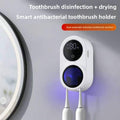 UV Sterilizing Toothbrush Holder in white ABS plastic with a black digital display, blue-lit sterilizing chamber and two toothbrushes