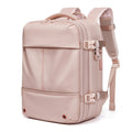 Vacuum Compression Travel Backpack in blush pink with smooth fabric, padded shoulder straps, compression zippers and buckles