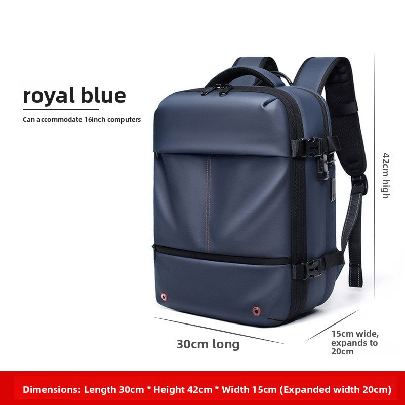 Vacuum Compression Travel Backpack in royal blue with a smooth Oxford cloth finish, front zipper and adjustable side compression straps