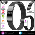 VIBE LOOP Ban smart wristband with a slim black display, textured black mesh band and detachable strap design