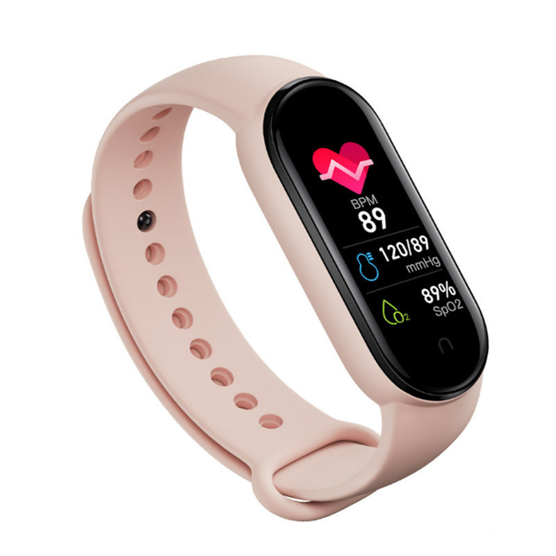 VIBE LOOP Ban M7 smart bracelet with a pale pink silicone strap and glossy black health display showing heart rate and oxygen readings