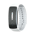 VIBE LOOP Ban Mosquito wristband with a white silicone strap and black checkerboard face, featuring a slim control strip and button