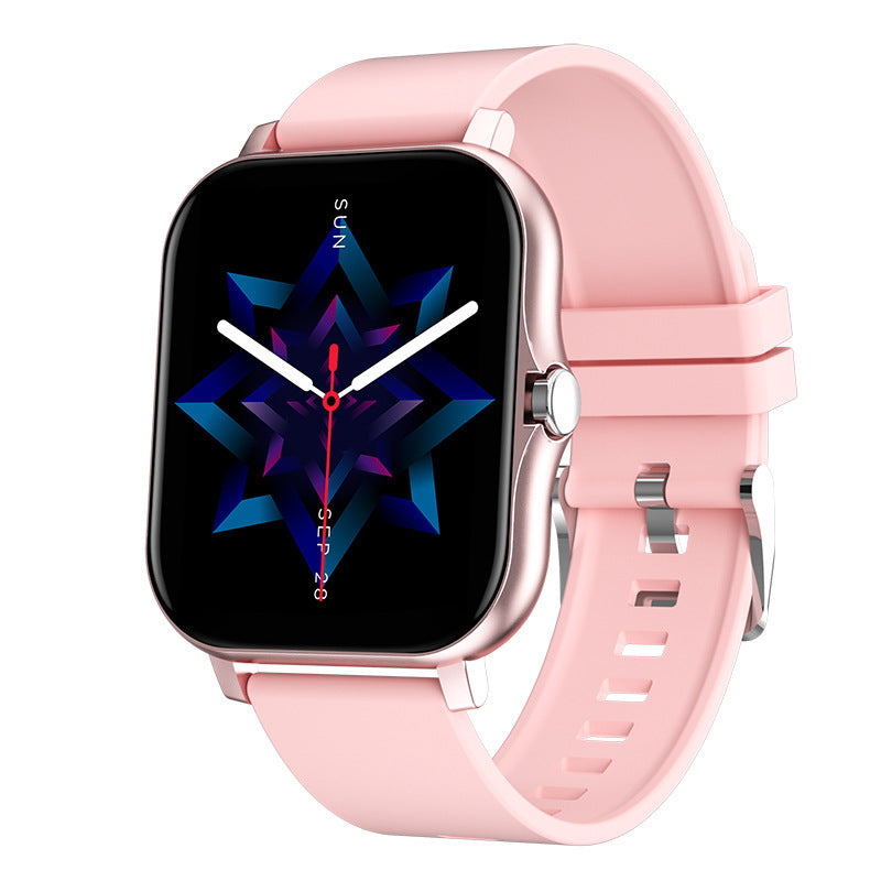 VIBE LOOP Ban smartwatch with a square rose-gold case, pale pink silicone strap and bold geometric blue-purple dial