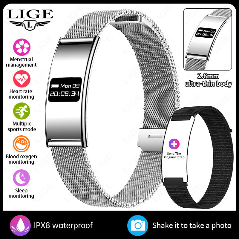 VIBE LOOP Ban smart wristband with a polished silver rectangular screen and finely woven metal mesh strap, plus black strap