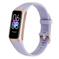 Fitness band in pale lavender silicone with a rose-gold trim and black rectangular screen; VIBE LOOP Ban Sleek has a slim curved design.