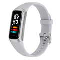 VIBE LOOP Ban Sleek fitness band with a silver case, light gray silicone strap and slim rectangular color display