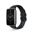 VIBE LOOP Ban Smart Watch with a black silicone band, rounded rectangular screen, gold-tone clock markings, and buckle closure