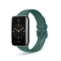 VIBE LOOP Ban Smart Watch with a dark green flexible strap, rectangular black screen, gold-tone hands and buckle holes