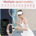 VIBE LOOP Ban smart wristband with a rose gold mesh strap and rectangular display, shown with sports tracking modes