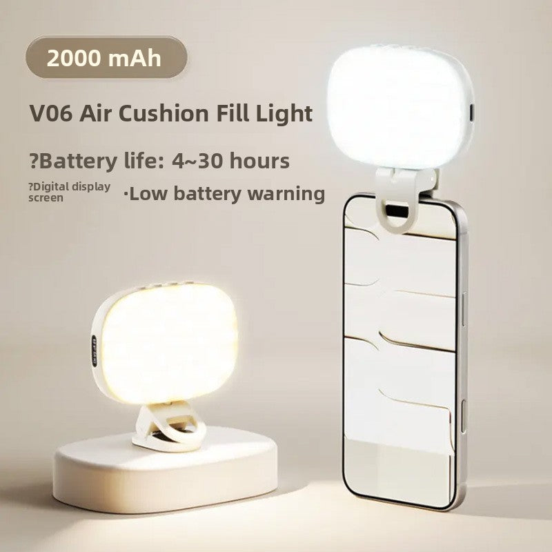 Phone selfie light, VIBE LOOP BANS, white rounded rectangular lamp with a digital display and loop-shaped phone attachment.
