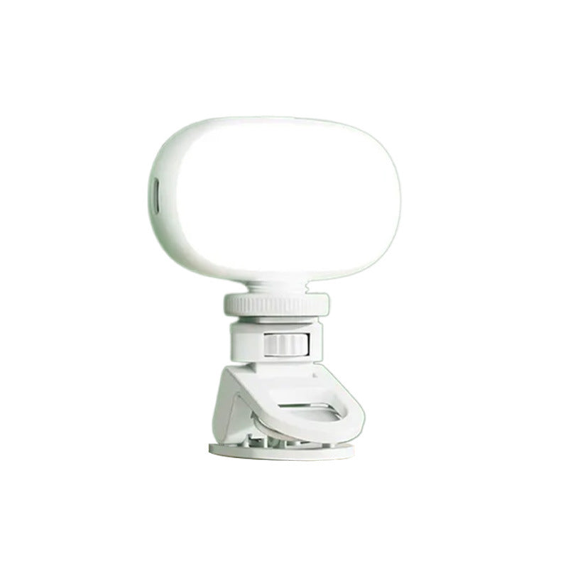 VIBE LOOP BANS selfie light in white with a smooth oval diffuser, ridged adjustment dial and spring clip mount
