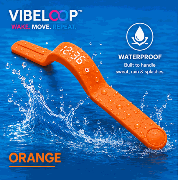 Vibration Loop Ban fitness tracker with a bright orange silicone band, raised dotted texture and illuminated digital display