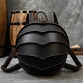 Vintage Genuine Leather backpack in dark brown with a rounded beetle-inspired shape, layered curved panels, and contrast stitching