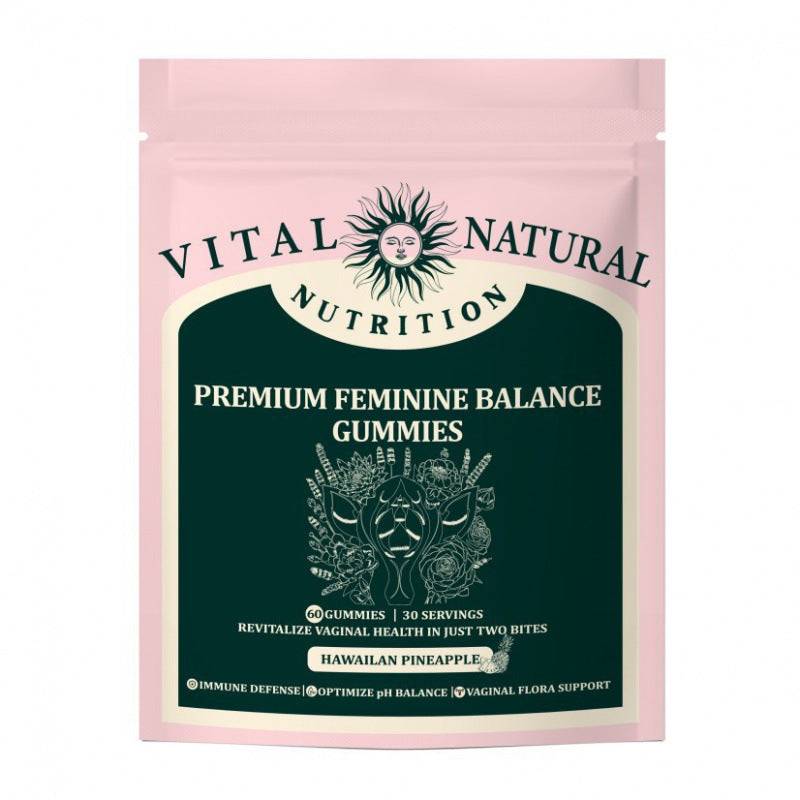 Gummy supplement pouch, Vital Natural Nutrition Premium in pale pink packaging with a dark green label and Hawaiian pineapple text.