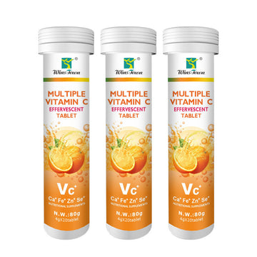 Vitamin C Tablets in three white plastic tubes with orange citrus graphics and effervescent tablet labels.
