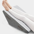Wedge Pillow Set in white and gray textured fabric, with raised cushioning supporting the legs and adjustable hook-and-loop straps