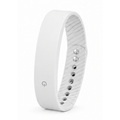 A white smart fitness band with a matte finish and a textured inner strap, shown on a clean white background.
