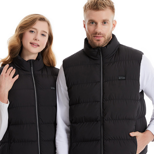 Winter Smart Electric Heating Jacket in black quilted polyester, sleeveless with a stand collar and front zipper, worn by a man and woman